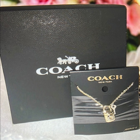 Coach Jewelry - Coach Gold-Tone Padlock Necklace. Box included. 🆕